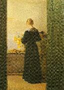 Anna Ancher en ung pige ordner blomster oil painting reproduction